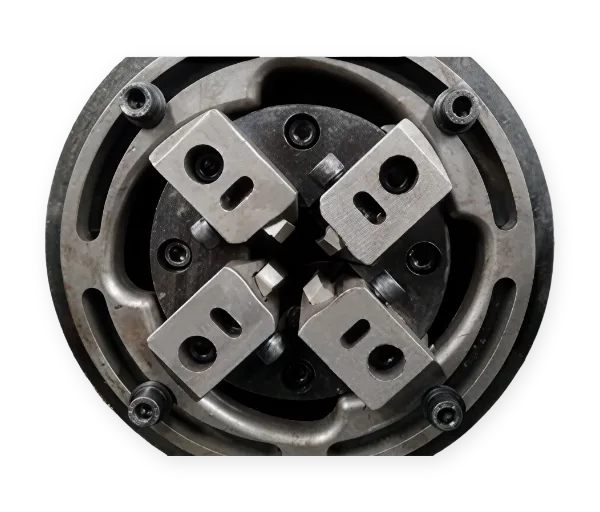 Detailed view of the heavy-duty thread rolling and rib peeling head assembly used in REBARLINK modular processing units for mechanical rebar connection.